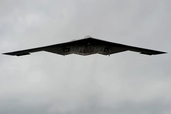 Framed Print : B-2 heavy bomber was designed with stealth technology to avoid radar detection while delivering both conventional or nuclear weapons. Andersen Air Force Base Guam. March 4 2009 Framed Print : B-2 heavy bomber was designed with stealth technology to avoid radar detection while delivering both conventional or nuclear weapons. Andersen Air Force Base Guam. March 4 2009