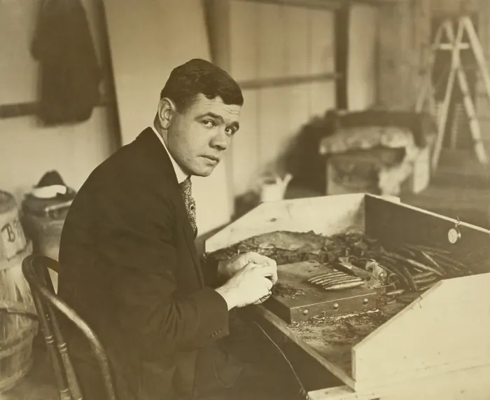 Framed Print : Babe Ruth rolling a Babe Ruth Cigar for his new business venture. Oct. 30, 1919. (BSLOC_2015_17_27)