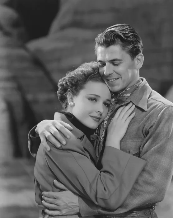 Framed Print : THE BAD MAN, from left: Laraine Day, Ronald Reagan, 1941