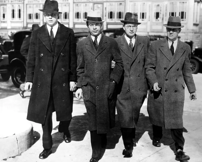 Framed Print : Bank robber and escaped convict, Willie the actor Sutton (2nd from left), in police custody being taken to city hall after a court hearing. 1934 Framed Print : Bank robber and escaped convict, Willie the actor Sutton (2nd from left), in police custody being taken to city hall after a court hearing. 1934