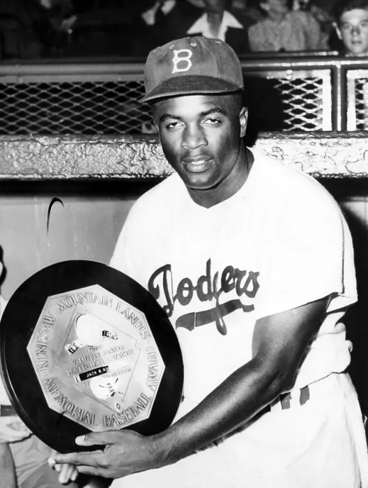 Framed Print : Baseball player Jackie Robinson of the Brooklyn Dodgers holds his MVP award in 1949.Courtesy CSU Archives / Everett Collection Framed Print : Baseball player Jackie Robinson of the Brooklyn Dodgers holds his MVP award in 1949.Courtesy CSU Archives / Everett Collection