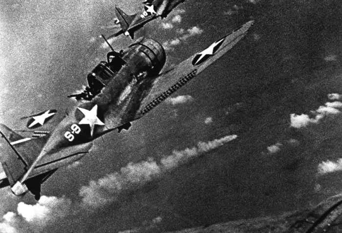 Framed Print : Battle of Midway, June 4-6, 1942. U.S. Douglas SBD-3 Dauntless dive bomber from the USS Hornet continues the attack on the burning Japanese cruiser Mikuma, June 6, 1942