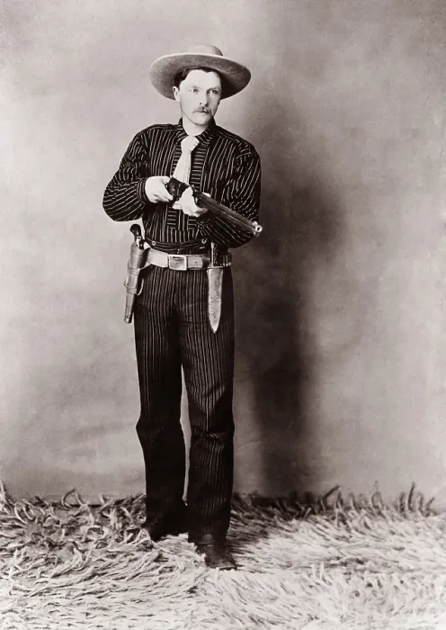 Framed Print : Bill Bennett, Wild West detective, armed with a rifle, revolver and knife. Ca. 1900 Framed Print : Bill Bennett, Wild West detective, armed with a rifle, revolver and knife. Ca. 1900