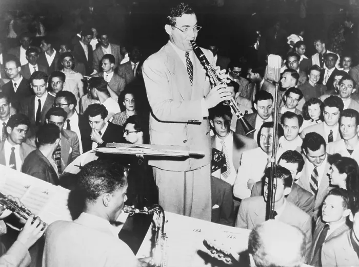 Framed Print : Benny Goodman (1909-86), playing clarinet, admirers look and listen. Goodman's Swing dance music was so loved, the dancers stopped to concentrate on the music. 1938
