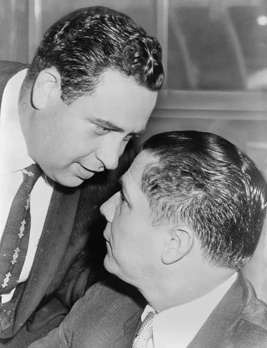 Framed Print : Bernard Spindel speaks to his co-defendant, James R. Hoffa, in their wiretapping trial. New York City, Nov. 1957 Framed Print : Bernard Spindel speaks to his co-defendant, James R. Hoffa, in their wiretapping trial. New York City, Nov. 1957