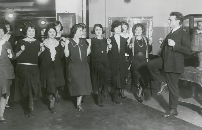 Framed Print : Bernarr Macfadden exhorting employees to exercise in his NYC publishing office, 1922