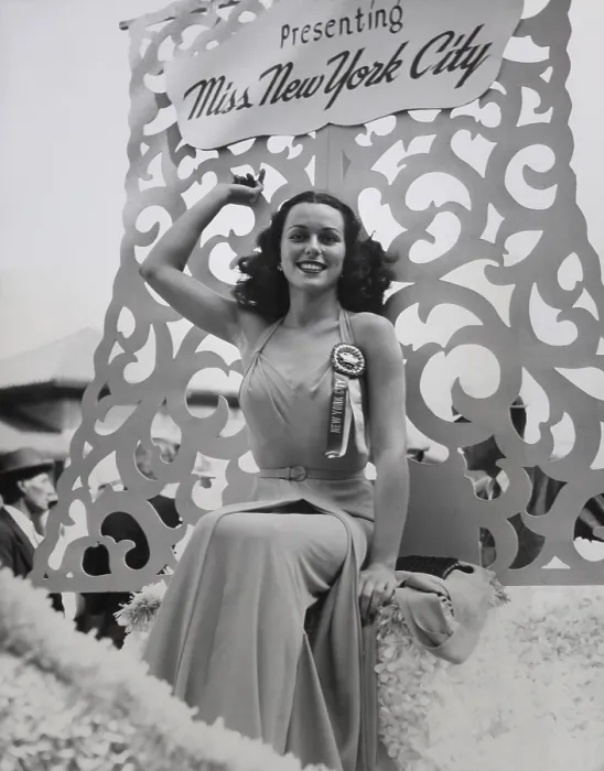 Framed Print : Bess Myerson, seated on the Miss New York City float during the parade in Atlantic City, N.J. Sept. 5, 1945