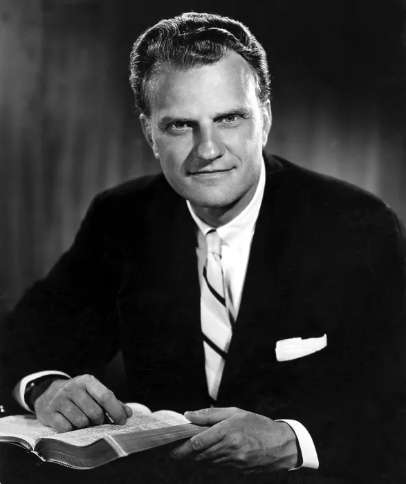 Framed Print : Billy Graham. Evangelist with Bible. Born 11 / 7 / 18 in publicity photo from 1964.. Courtesy: CSU Archives / Everett Collection Framed Print : Billy Graham. Evangelist with Bible. Born 11 / 7 / 18 in publicity photo from 1964.. Courtesy: CSU Archives / Everett Collection