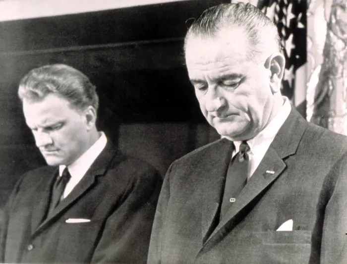 Framed Print : Billy Graham & President Lyndon B. Johnson in prayer at the White House, 1964. Courtesy: CSU Archives  /  Everett Collection