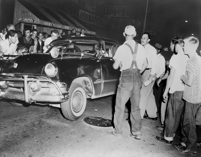 Framed Print : Billy Middlebrooks trying to dissuade a mob which is attempting to haul an African American motorist from his car, as the latter passed through Clinton, Tennessee. Aug. 31, 1956 Framed Print : Billy Middlebrooks trying to dissuade a mob which is attempting to haul an African American motorist from his car, as the latter passed through Clinton, Tennessee. Aug. 31, 1956