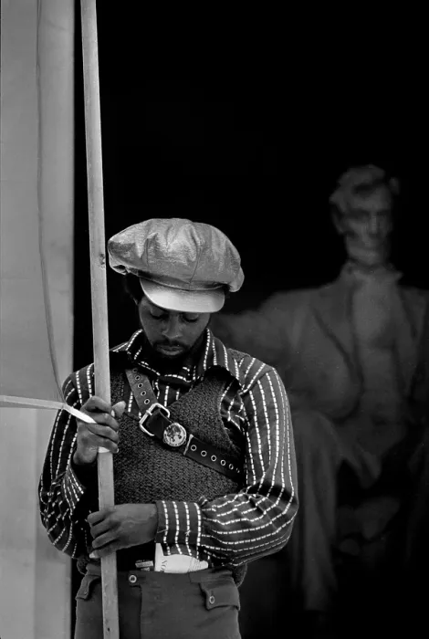 Framed Print : Black Panther convention, a man on the steps of the Lincoln Memorial holding a banner for the People's Constitutional Convention, by Thomas J. O'Halloran  /  Warren K