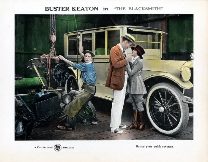 Framed Print : THE BLACKSMITH, lobbycard, Buster Keaton (left), Virginia Fox (right), 1922