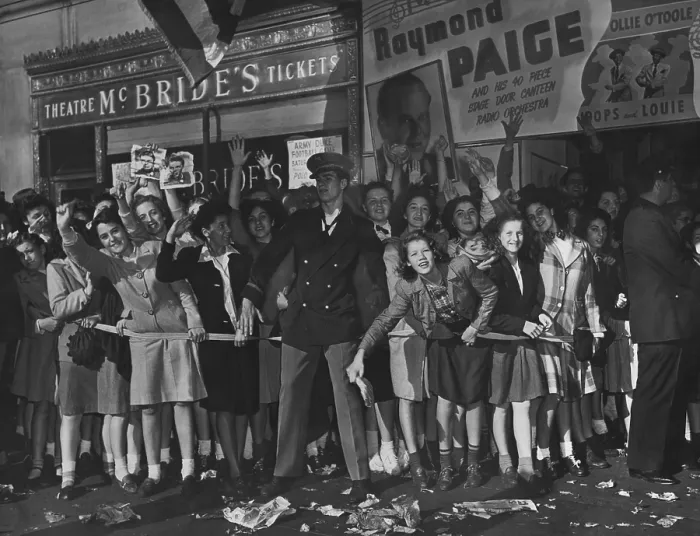 Framed Print : Bobby Soxer fans eagerly waiting to see Frank Sinatra outside the Paramount Theater. New York City, Oct. 12, 1944. (BSLOC_2015_14_163) Framed Print : Bobby Soxer fans eagerly waiting to see Frank Sinatra outside the Paramount Theater. New York City, Oct. 12, 1944. (BSLOC_2015_14_163)