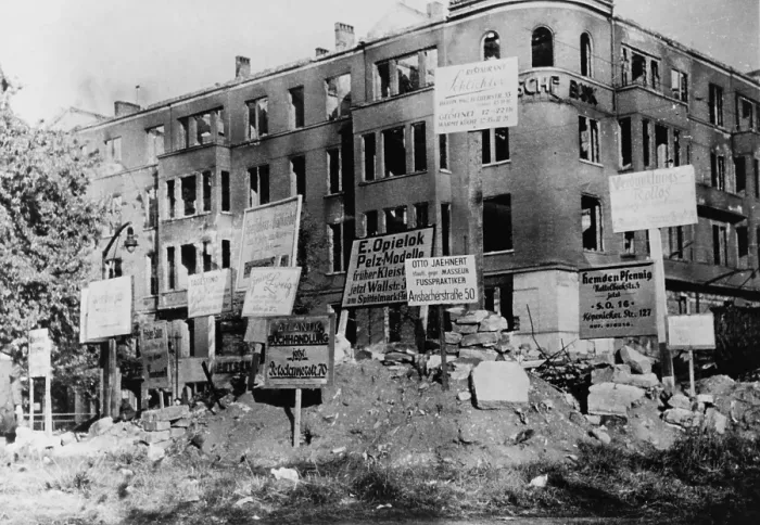 Framed Print : Bombed-out building in Wittenberg Platz, Berlin. Many of the signs posted give directions to merchants new locations Framed Print : Bombed-out building in Wittenberg Platz, Berlin. Many of the signs posted give directions to merchants new locations