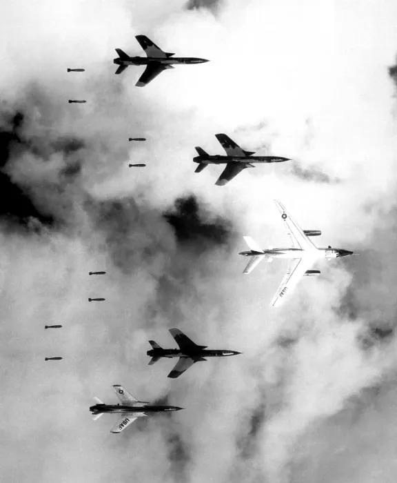 Framed Print : Bombing North Vietnam. US Air Force F-105 Thunderchief bomb a military target through low clouds over the southern panhandle of North Viet Nam. June 14, 1966 Framed Print : Bombing North Vietnam. US Air Force F-105 Thunderchief bomb a military target through low clouds over the southern panhandle of North Viet Nam. June 14, 1966