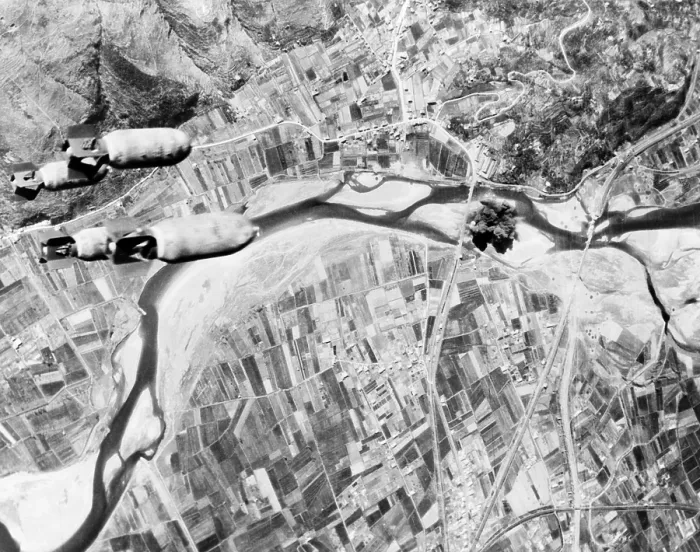 Framed Print : Bombs hurtle toward a Nazi highway bridge. With their rail and shipping facilities almost completely disrupted, the Germans were forced to resort to motor transport Framed Print : Bombs hurtle toward a Nazi highway bridge. With their rail and shipping facilities almost completely disrupted, the Germans were forced to resort to motor transport