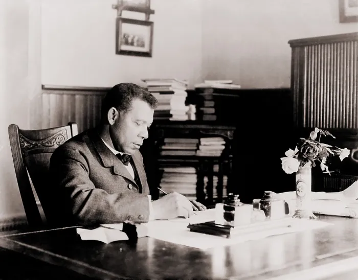 Framed Print : Booker T. Washington (1856-1915), writing at his desk. His autobiography, UP FROM SLAVERY, 1901, was a best seller Framed Print : Booker T. Washington (1856-1915), writing at his desk. His autobiography, UP FROM SLAVERY, 1901, was a best seller