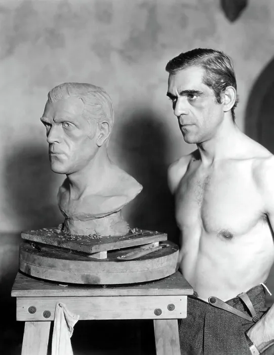 Framed Print : BORIS KARLOFF caught while posing for sculptor Ivan Simpson, 1933