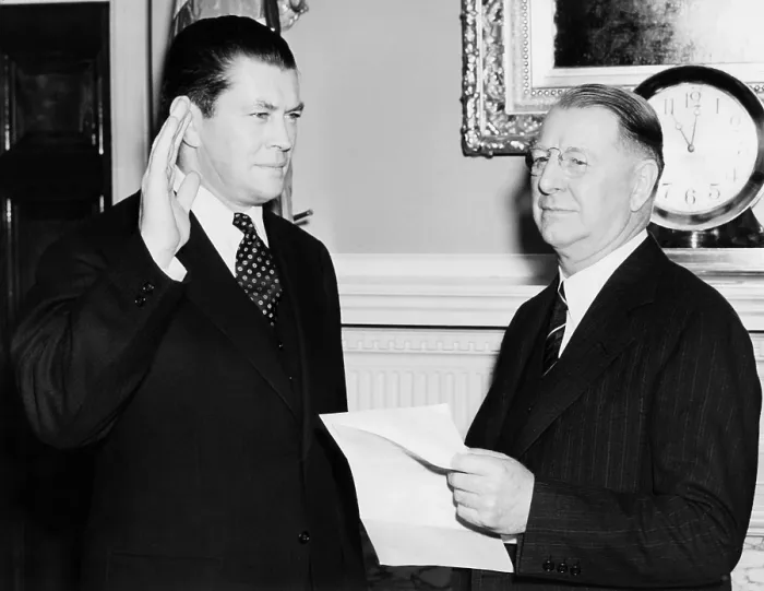 Framed Print : Former Boxer Gene Tunney is commissioned in the Naval Reserves. Tunney takes his oath from Navy Secretary Frank Knox. As a Lt