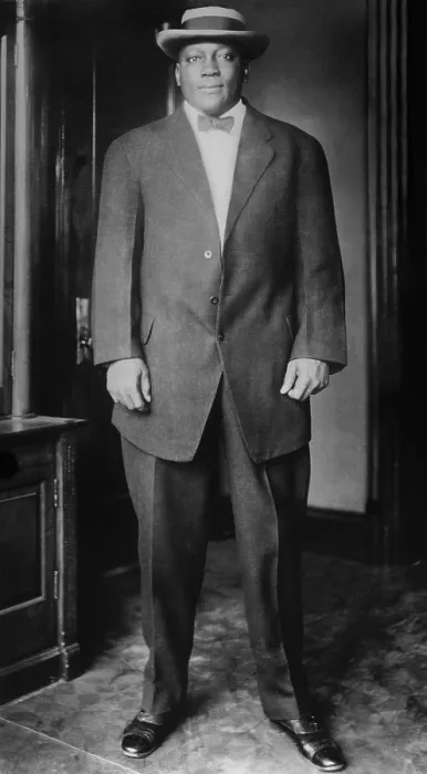 Framed Print : Boxer John Johnson, World Heavyweight Champion, in a business suit, bow tie, and felt hat, c. 1910-12 (BSLOC_2018_4_151)