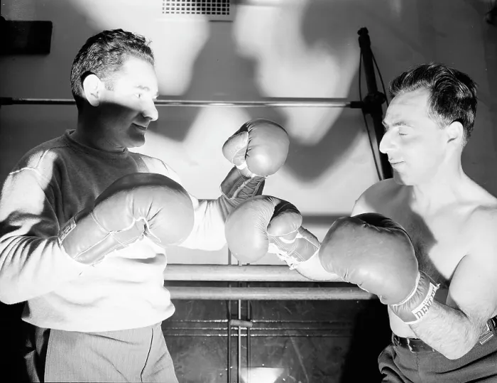 Framed Print : Boxing. Boxing instructor, Maurice Case, giving instructions to Joe Brun at the Lighthouse, an institution for the blind, at 111 East Fifty-ninth Street. ca 1944 Framed Print : Boxing. Boxing instructor, Maurice Case, giving instructions to Joe Brun at the Lighthouse, an institution for the blind, at 111 East Fifty-ninth Street. ca 1944