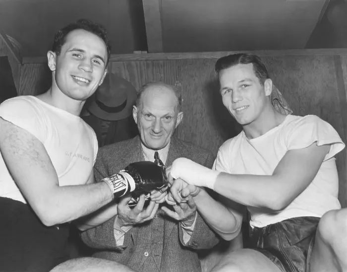 Framed Print : Boxing promoter Mike Jacobs between middleweight boxers, Tony Zale and Georgie Abrams. They were promoting a reprise of their Nov