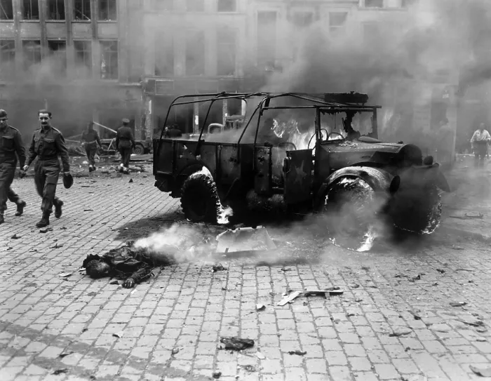 Framed Print : This boy's dead body and burning U.S. Jeep after a V-2 Strike in Antwerp, Belgium, Nov. 27, 1944