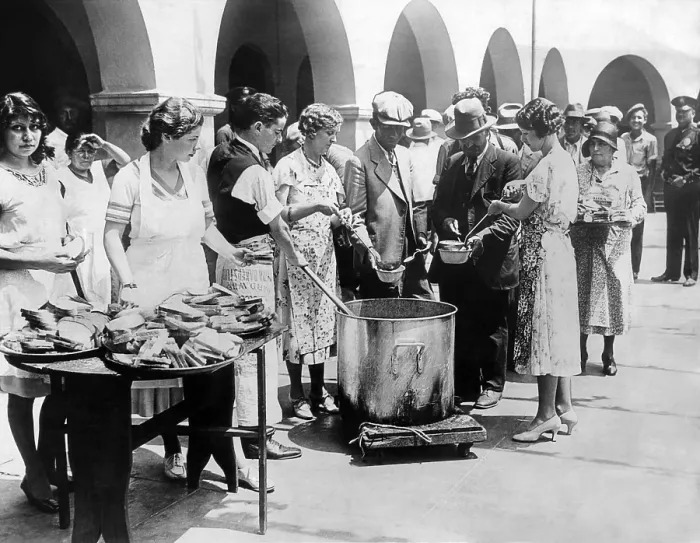 Framed Print : Breadline in Los Angeles serving soup and bread. The Spanish Colonial church, Neustra Senora La Reina de Los Angeles, feeds 700 unemployed on the patio of the old church Framed Print : Breadline in Los Angeles serving soup and bread. The Spanish Colonial church, Neustra Senora La Reina de Los Angeles, feeds 700 unemployed on the patio of the old church