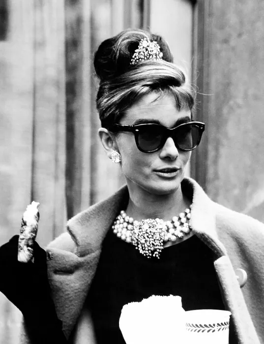 Framed Print : BREAKFAST AT TIFFANY'S, Audrey Hepburn eating between scenes on set, 1961 Framed Print : BREAKFAST AT TIFFANY'S, Audrey Hepburn eating between scenes on set, 1961