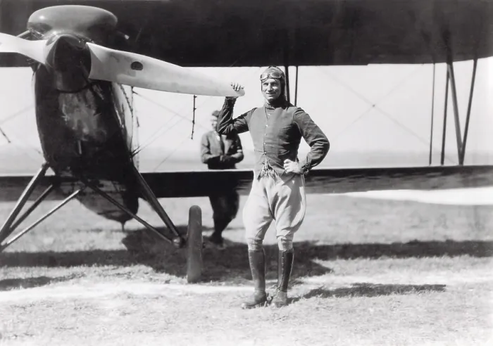 Framed Print : Brigadier General Billy Mitchell, in aviator's clothes, standing beside a pursuit plane, 1920-25. (BSLOC_2016_7_22)