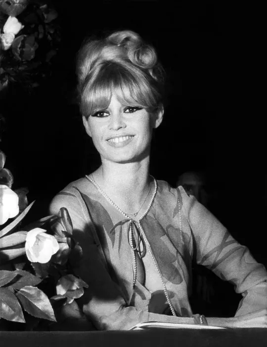Framed Print : Brigitte Bardot smiles from a box at the Opera National Theater, Paris. April 12, 1966. She was attending the 36th annual gala of the Artists Union. - (CSU_2015_6_232)