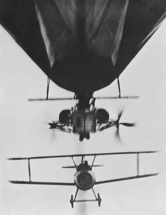 Framed Print : British aeroplane dropping off, after release from a dirigible, during WW1, 1914-18. (BSLOC_2016_13_178.jpg )
