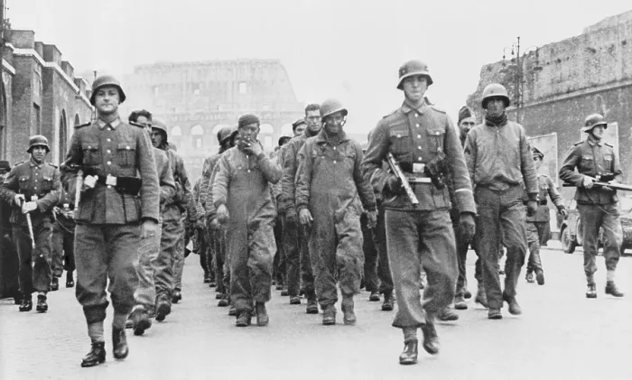 Framed Print : British and American prisoners of war marching through Rome under guard of German soldiers