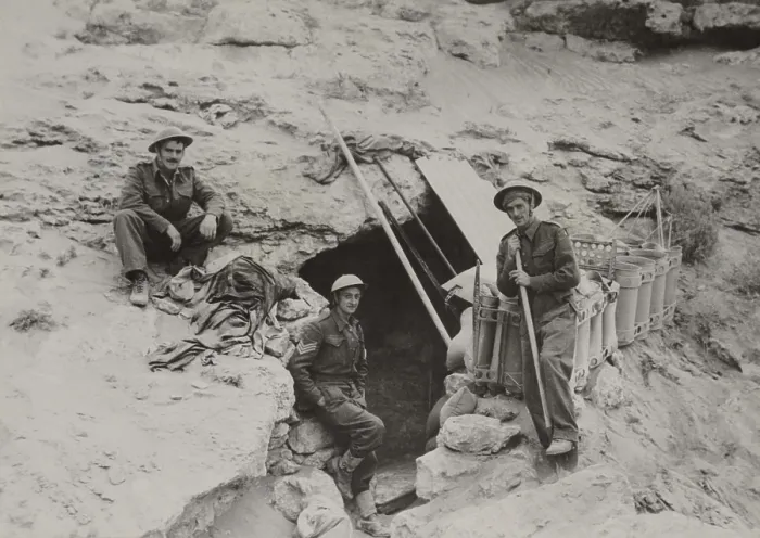 Framed Print : British defenders of the Tobruk garrison find sanctuary from the nightly bombing. They shelter in dug out caves with six to ten feet of solid rock as a roof. April - Nov Framed Print : British defenders of the Tobruk garrison find sanctuary from the nightly bombing. They shelter in dug out caves with six to ten feet of solid rock as a roof. April - Nov