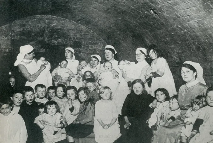 Framed Print : British nannies in a basement bomb shelter, probably in London during World War 1. From 1915-1918, Britain suffered approximately 50 raids with about 550 deaths and 1350 injuries Framed Print : British nannies in a basement bomb shelter, probably in London during World War 1. From 1915-1918, Britain suffered approximately 50 raids with about 550 deaths and 1350 injuries