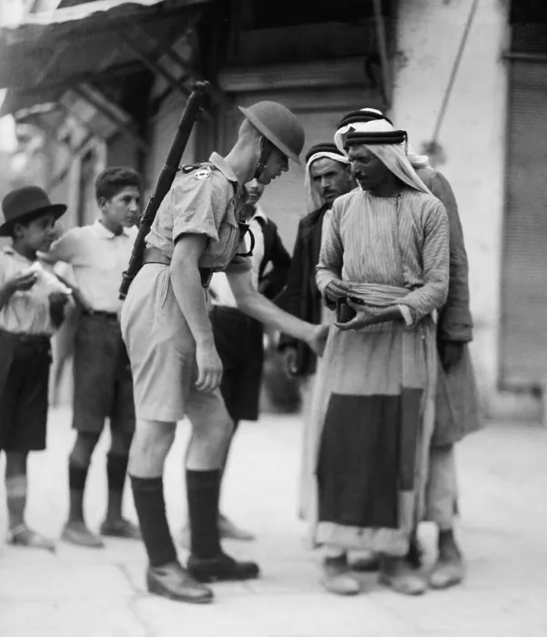 Framed Print : British soldier checking papers and searching Arabs for arms at the Jaffa Gate, Jerusalem. 1936 during the Arab Revolt (BSLOC_2017_1_203) Framed Print : British soldier checking papers and searching Arabs for arms at the Jaffa Gate, Jerusalem. 1936 during the Arab Revolt (BSLOC_2017_1_203)