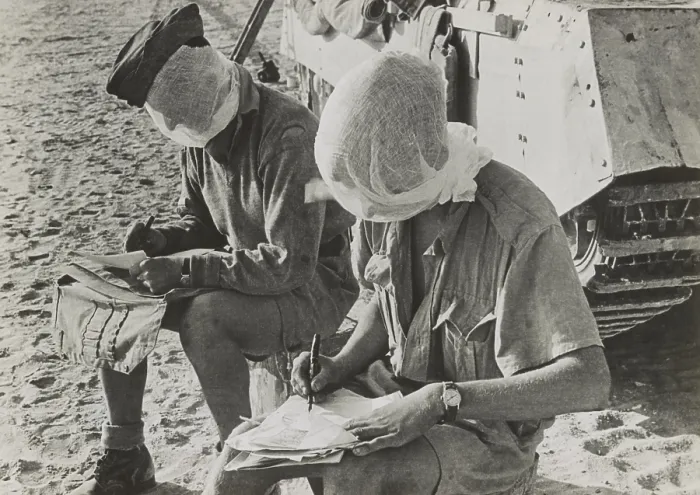 Framed Print : British soldiers with their heads covered by mosquito nets keep flies away. They are at El Alamein, and writing letters while sitting beside their tanks. Ca. 1940-42 Framed Print : British soldiers with their heads covered by mosquito nets keep flies away. They are at El Alamein, and writing letters while sitting beside their tanks. Ca. 1940-42