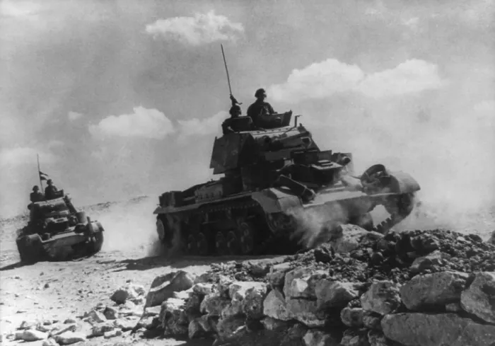 Framed Print : British soldiers patrolling in tanks at Tobruk, Libya, during World War 2. Ca. 1941-42. (BSLOC_2014_10_2)