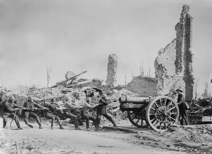 Framed Print : Six British soldiers pull a gun into position amid ruins in France during World War 1. 1915-1918. (BSLOC_2016_13_155.jpg )
