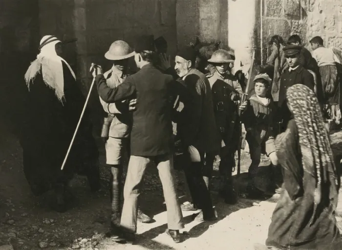 Framed Print : British soldiers search Arab men for weapons in Jerusalem on Nov. 2nd, 1921