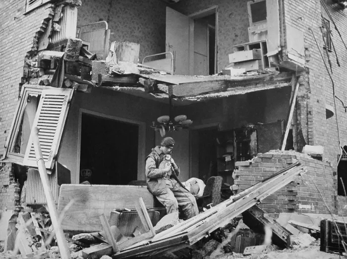 Framed Print : British Trooper rescued a puppy from the ruins German apartment in Geilenkirchen. Nov. 1944. Germany, World War 2. (BSLOC_2014_8_100)