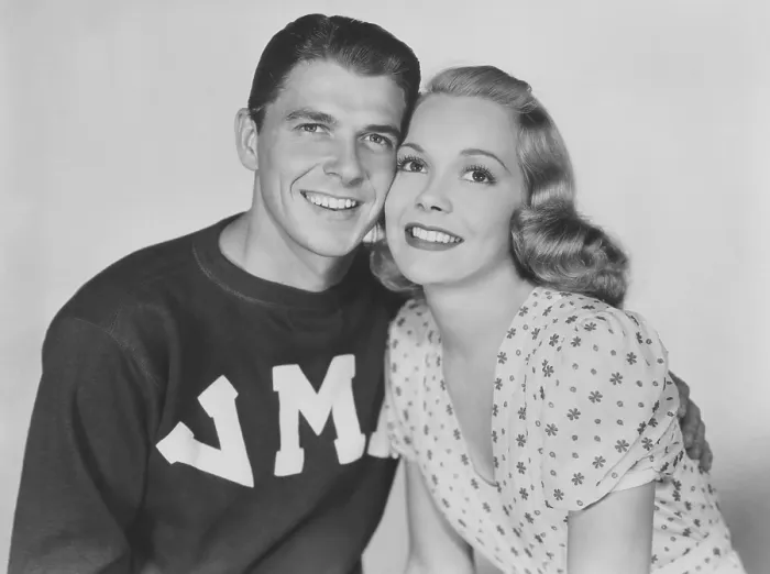 Framed Print : BROTHER RAT, from left: Ronald Reagan, Jane Wyman, 1938