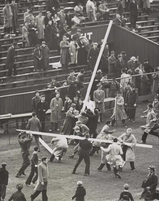 Framed Print : Brown University students tear down the goal posts in celebration of a 7-6 win over Columbia. Oct. 23, 1937. - (BSLOC_2015_1_217)