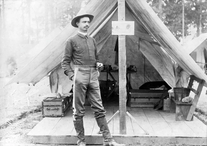 Framed Print : Buffalo soldier. T.R. Clarke, 8th US Volunteer Infantry, standing in front of tent, during the Spanish-American War. ca. 1898 Framed Print : Buffalo soldier. T.R. Clarke, 8th US Volunteer Infantry, standing in front of tent, during the Spanish-American War. ca. 1898