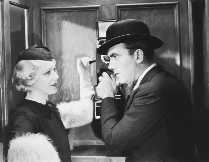 Framed Print : BUREAU OF MISSING PERSONS, from left: Glenda Farrell, Pat O'Brien, 1933