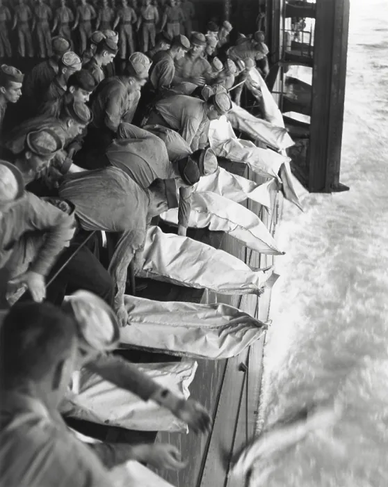 Framed Print : Burial at sea for the officers and men of the USS Intrepid during World War 2. They were killed when the carrier was hit by Japanese bombs during operations in the Philippines