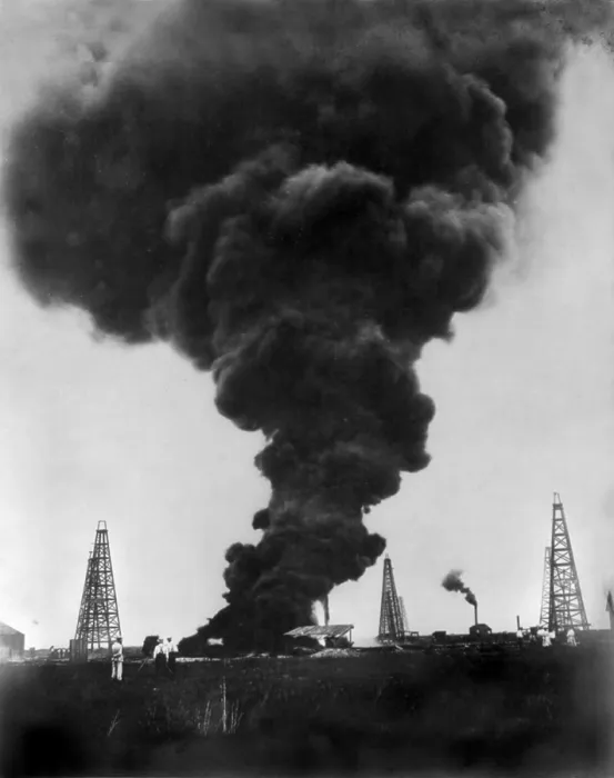 Framed Print : A burning gusher, smoke above a burning oil well, Jennings, Louisiana, photograph, 1902