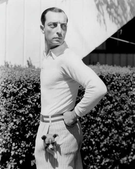 Framed Print : Buster Keaton with a puppy in his pocket