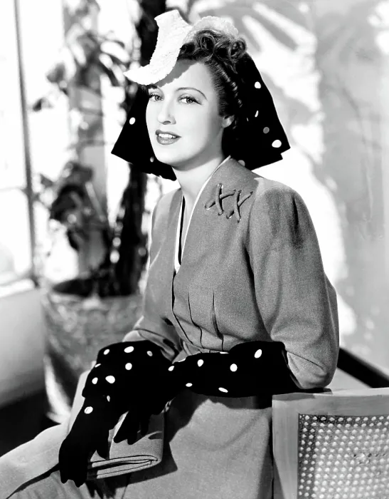 Framed Print : CAIRO, Jeanette MacDonald, in a green wool suit with black and yellow dotted accessories by Robert Kalloch, 1942 Framed Print : CAIRO, Jeanette MacDonald, in a green wool suit with black and yellow dotted accessories by Robert Kalloch, 1942