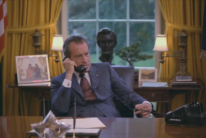 Framed Print : Candid photo of Richard Nixon at his desk in the oval office was taken during a filming for the 1972 GOP convention. June 23 1972